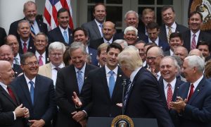 Bunch of grinning male politicians